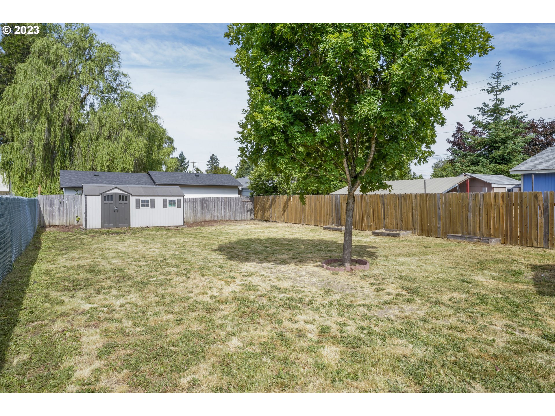 760 28th Street Springfield, OR 97477 - Photo 25 of 30 a house with green field in front of it