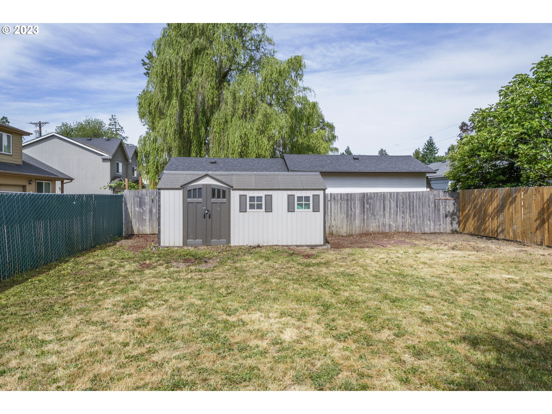 760 28th Street Springfield, OR 97477 - Photo 26 of 30 a backyard of a house with wooden fence
