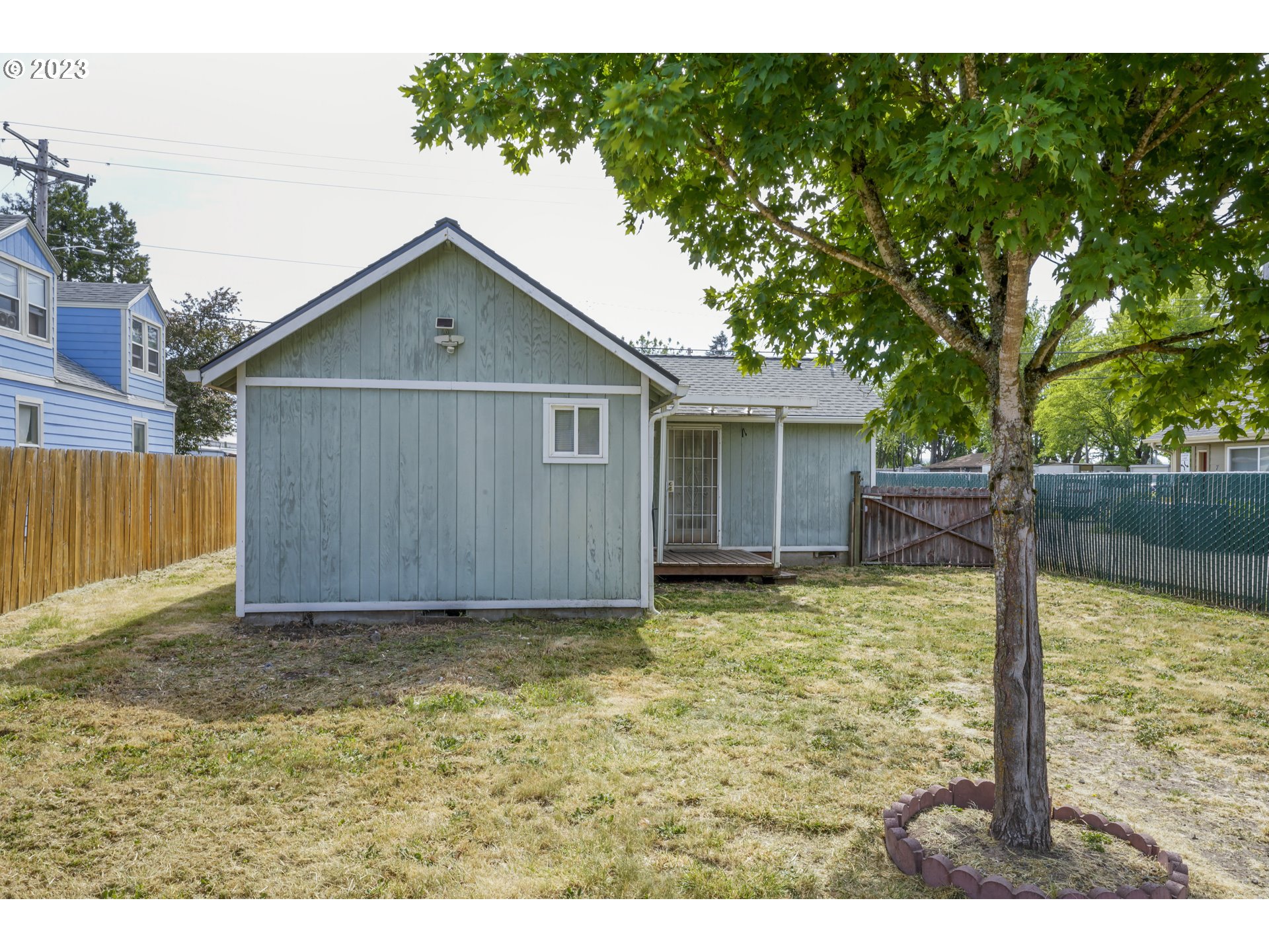 760 28th Street Springfield, OR 97477 - Photo 28 of 30 a view of a house with a yard