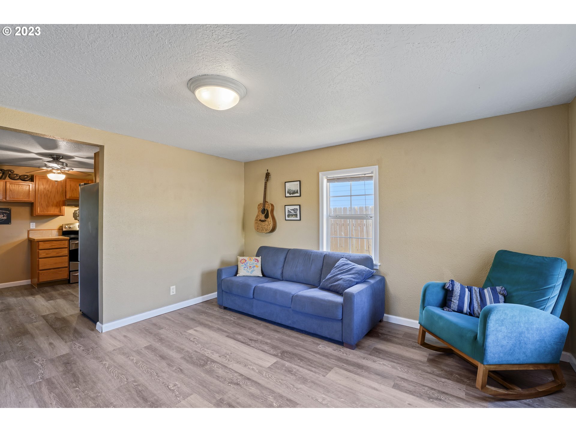 760 28th Street Springfield, OR 97477 - Photo 6 of 30 a living room with furniture and a window