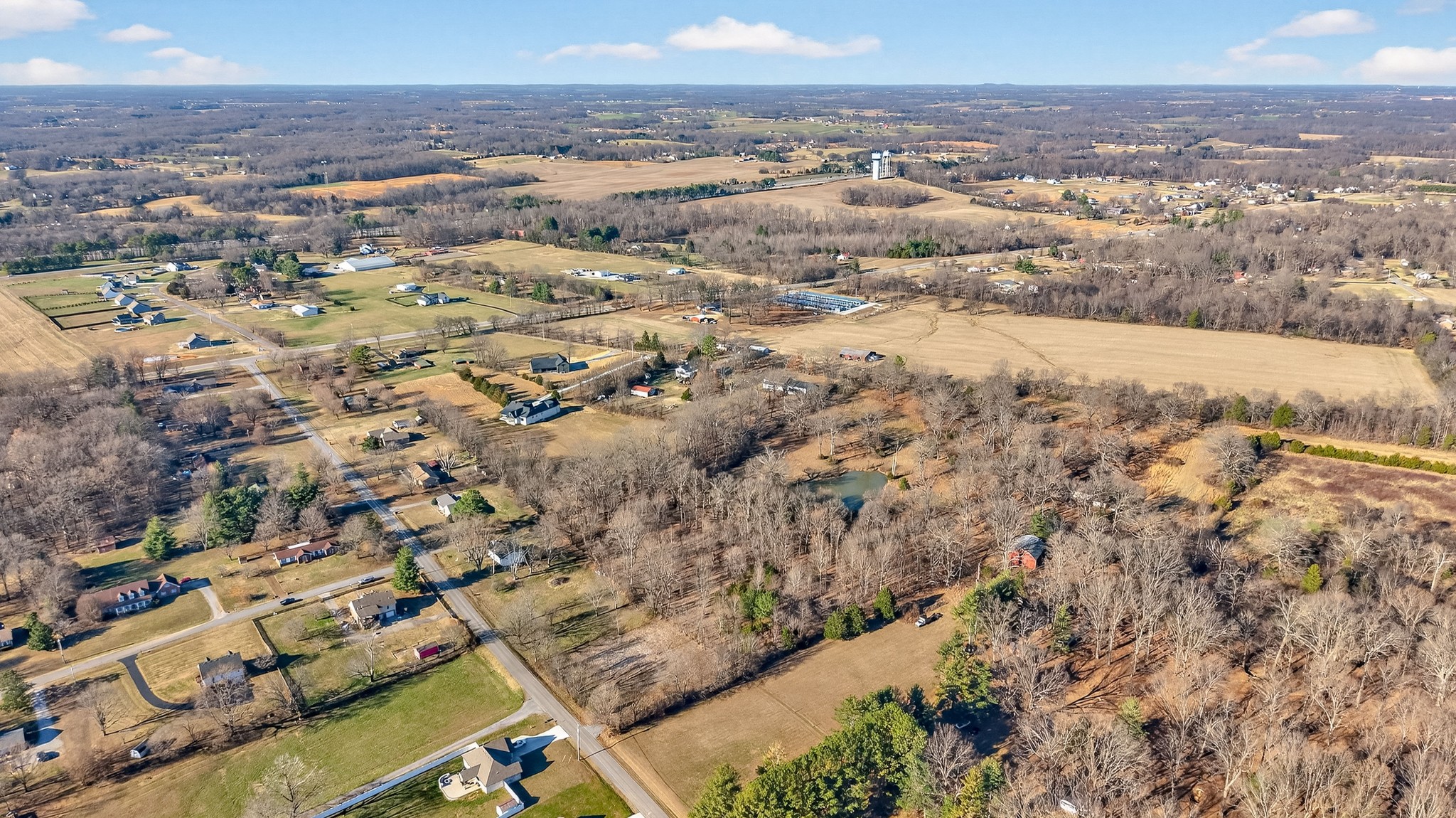 1991 Raymond Hodges Road Cottontown, TN 37048 - Photo 12 of 20 an aerial view of residential houses with outdoor space