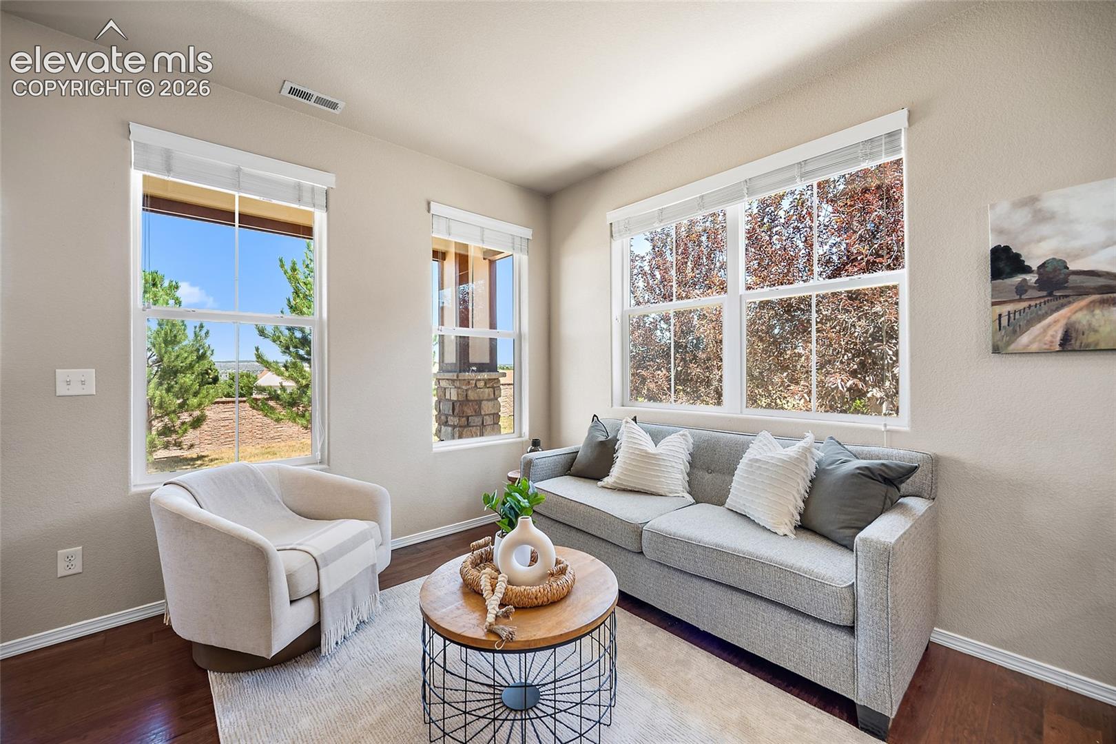 5348 Prominence Point Colorado Springs, CO 80923 - Photo 3 of 29 Family Room with City and Mountain Views
