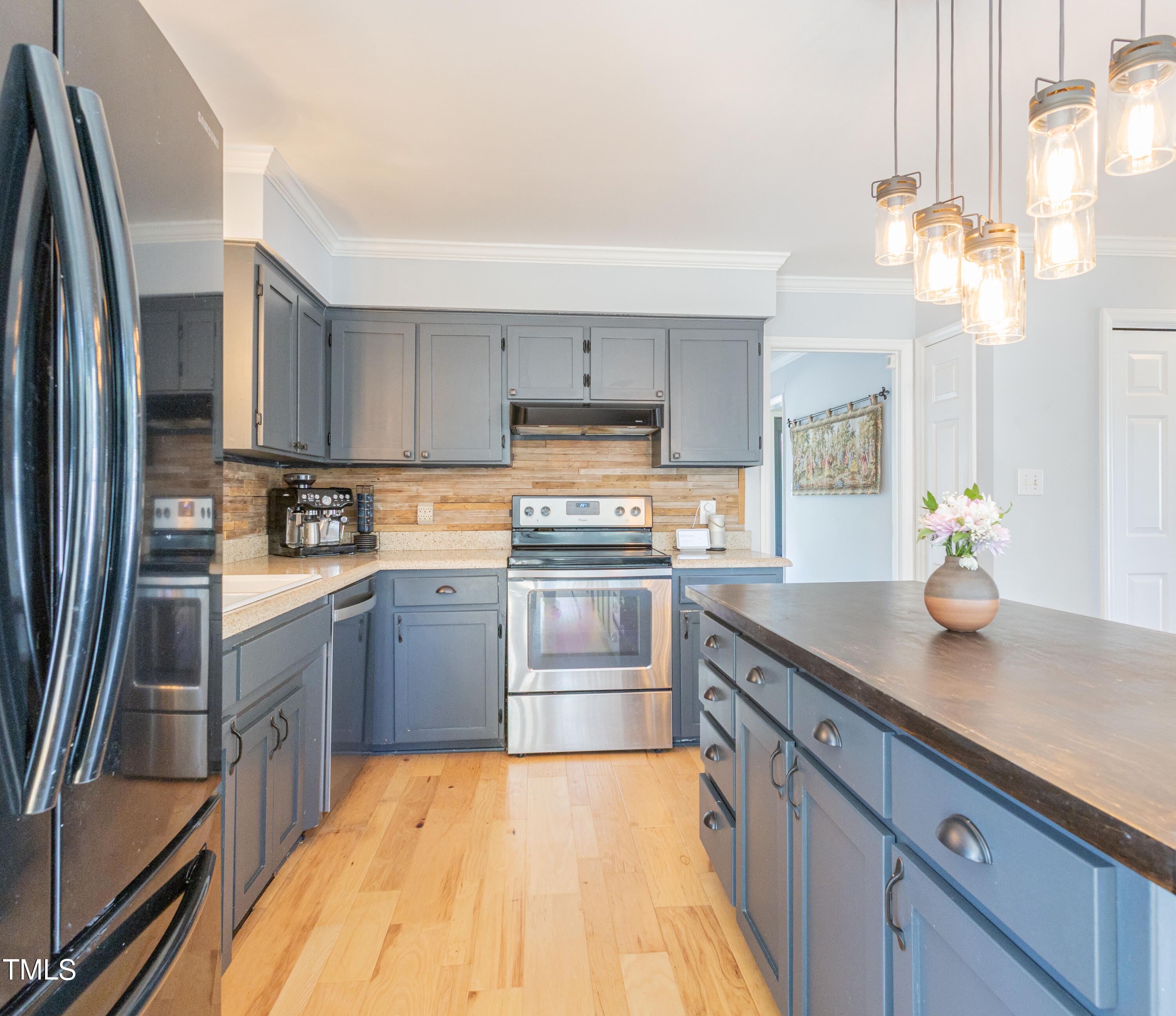 116 Lakeshore Drive Durham, NC 27713 - Photo 10 of 36 a kitchen with a sink and stainless steel appliances