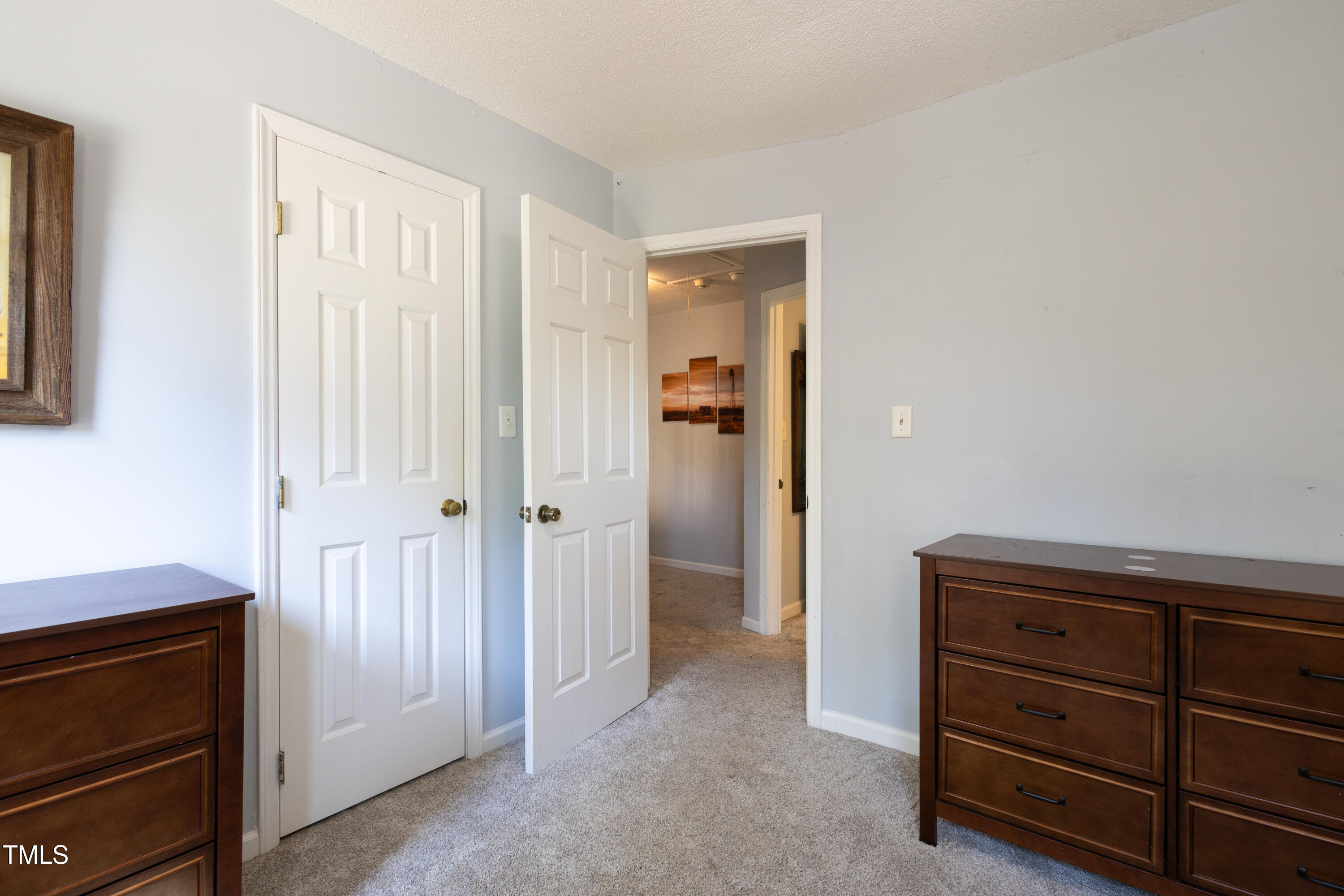 116 Lakeshore Drive Durham, NC 27713 - Photo 20 of 36 a view of a dresser with wooden floor