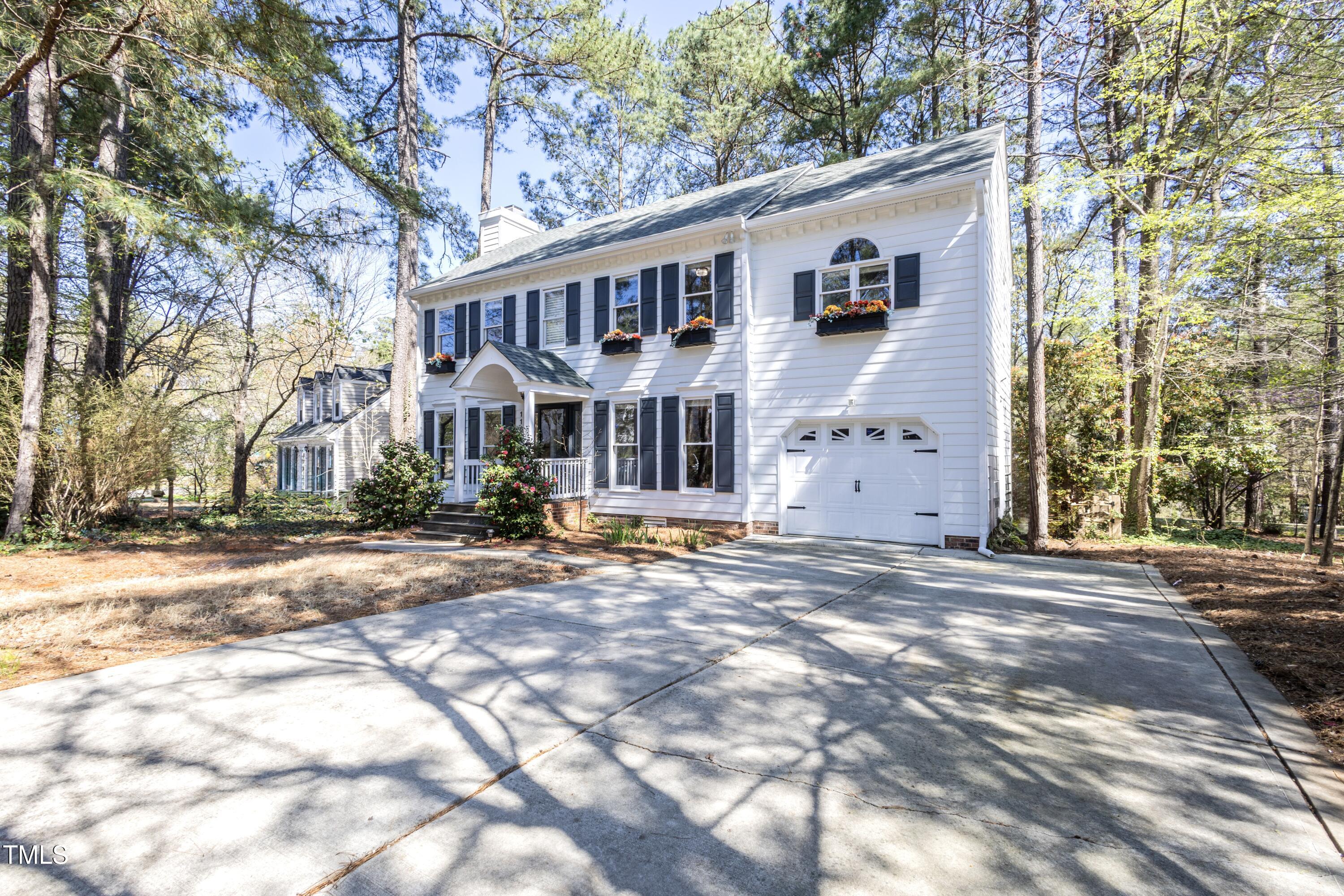 116 Lakeshore Drive Durham, NC 27713 - Photo 2 of 36 a view of a house with a street