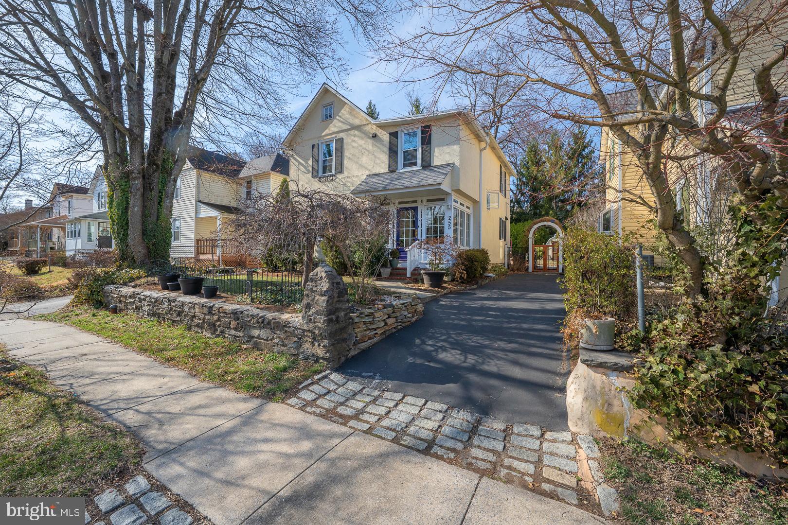 a view of a street with houses on both side