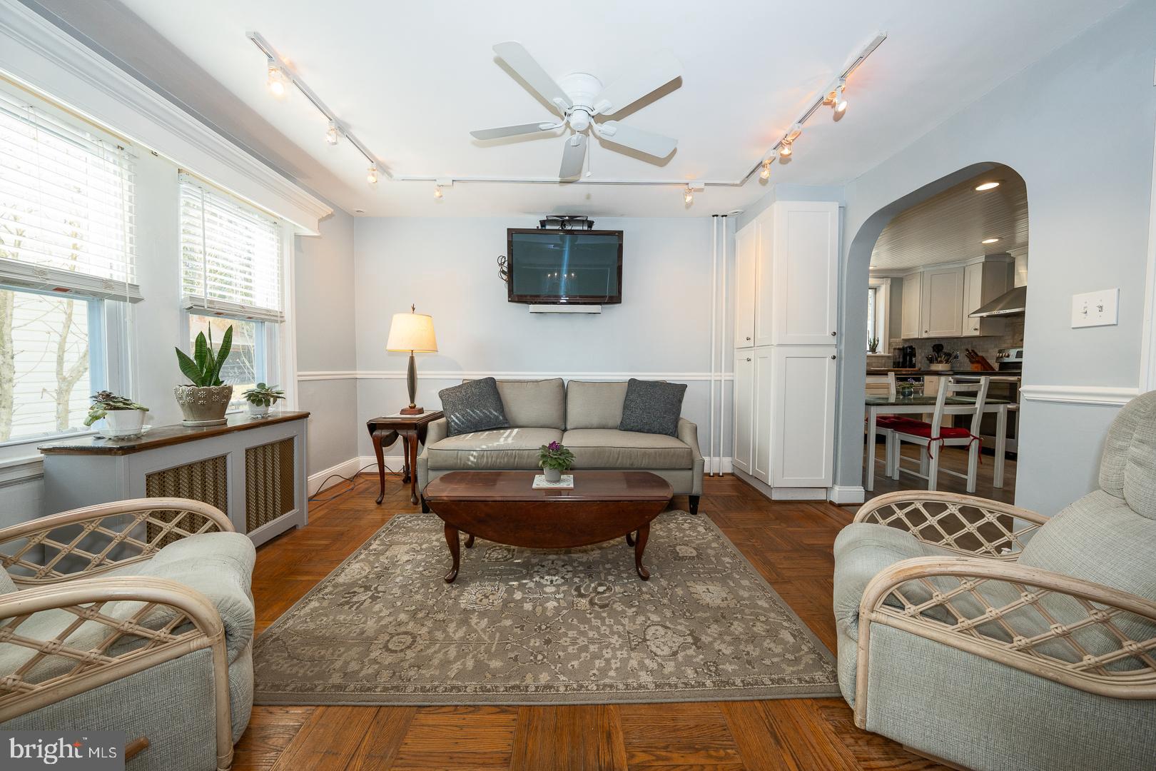 255 Willow Avenue Wayne, PA 19087 - Photo 14 of 46 a living room with furniture a flat screen tv and a rug