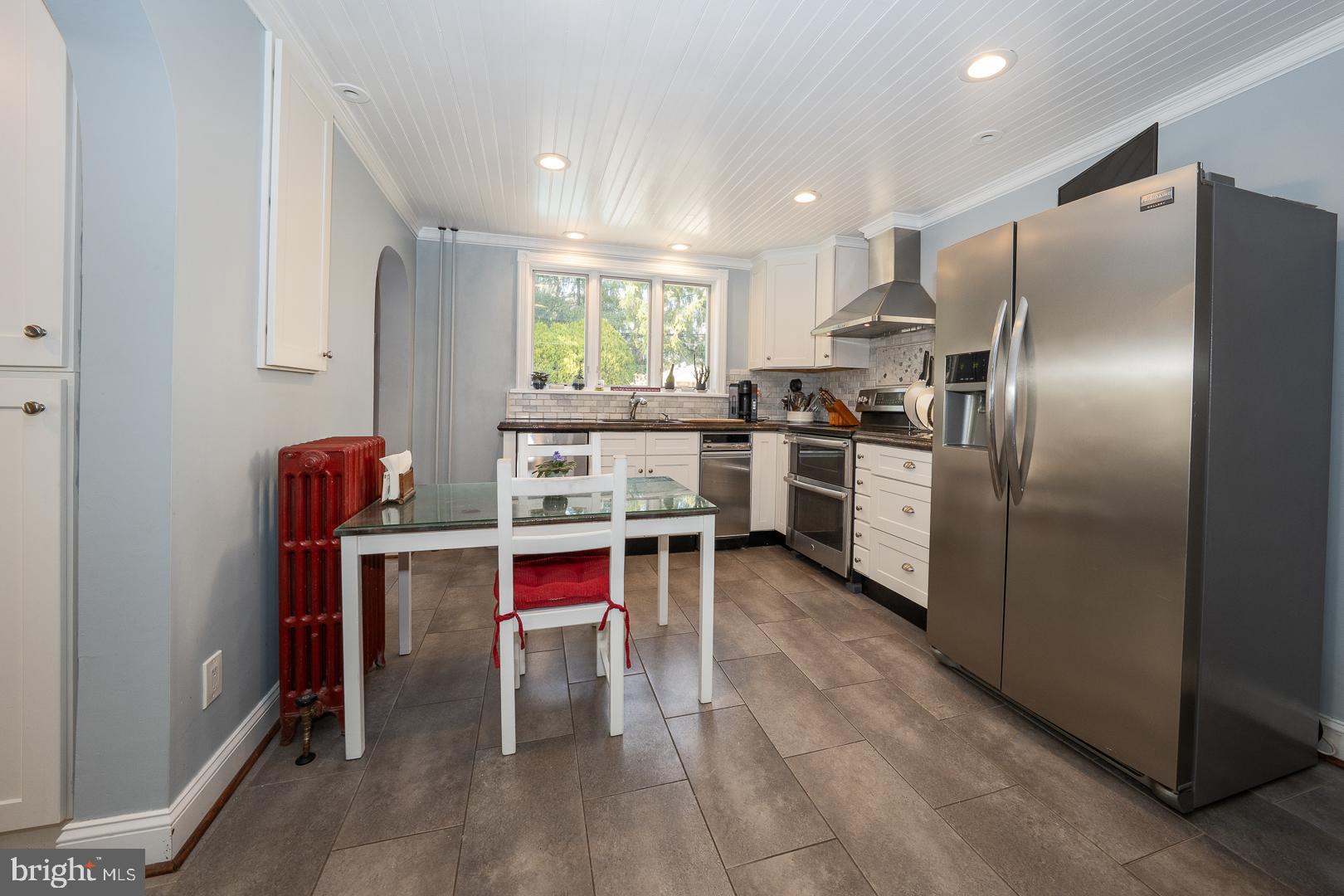 255 Willow Avenue Wayne, PA 19087 - Photo 20 of 46 a kitchen with stainless steel appliances granite countertop a refrigerator and a stove top oven