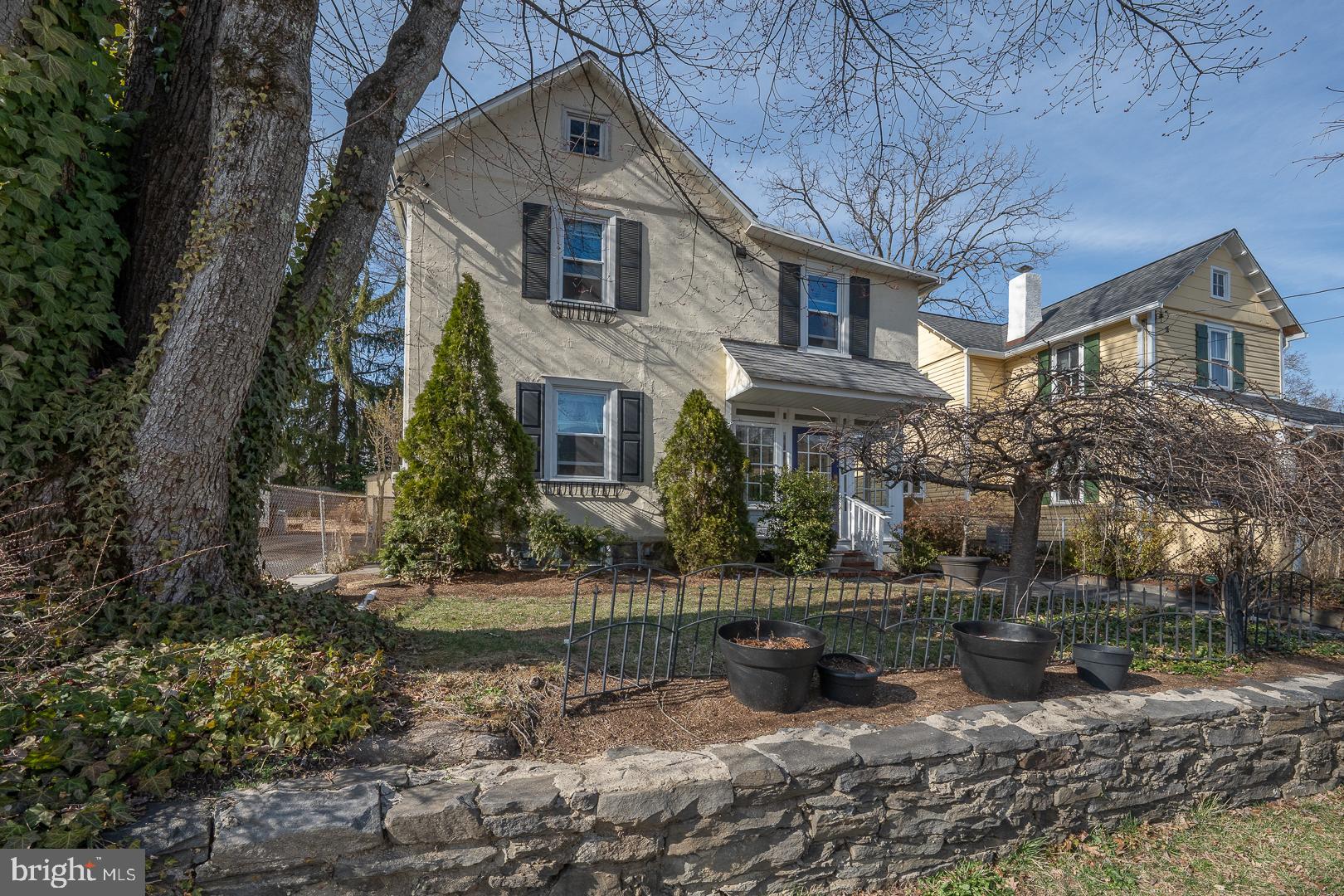 255 Willow Avenue Wayne, PA 19087 - Photo 2 of 46 a front view of a house with garden