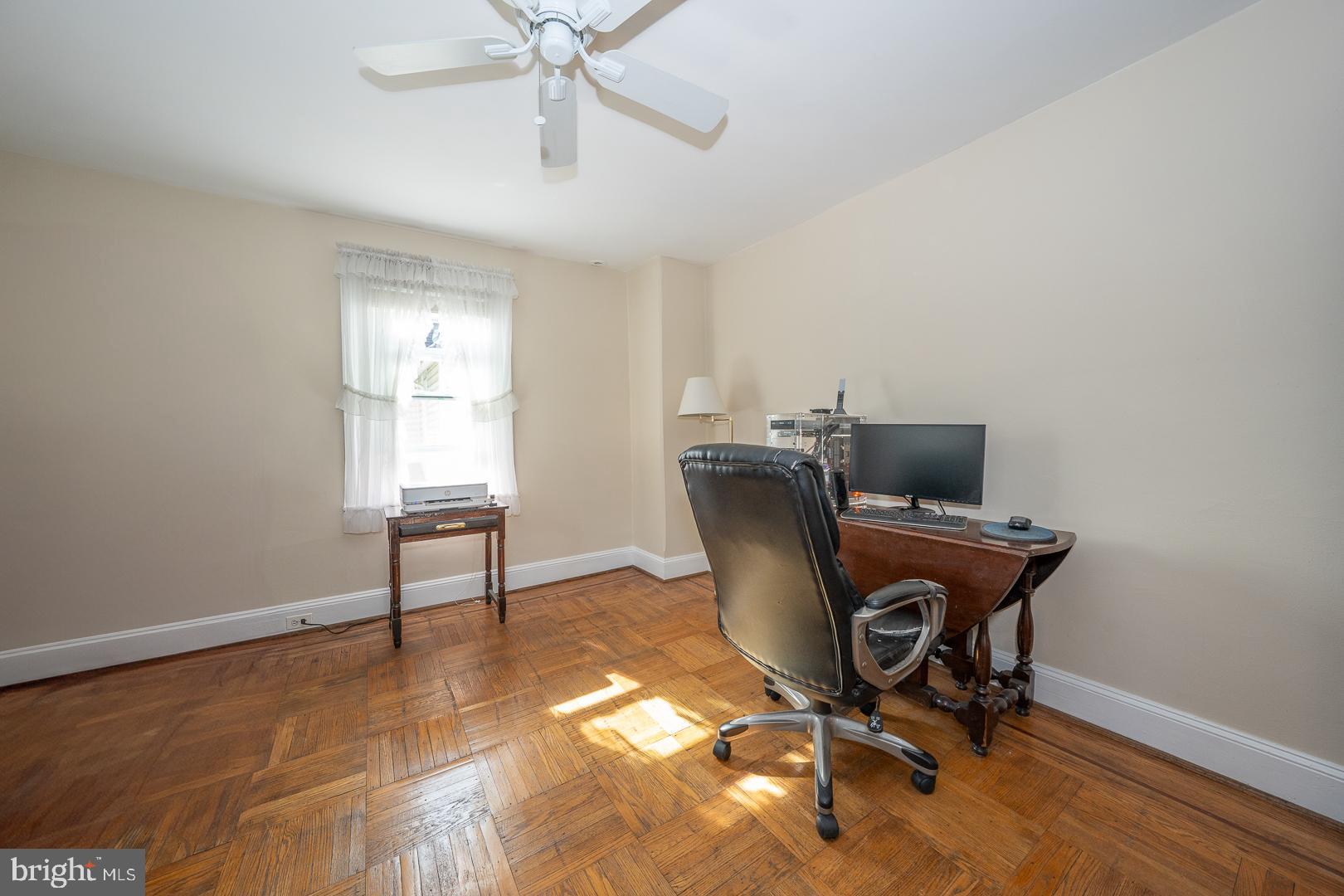 255 Willow Avenue Wayne, PA 19087 - Photo 26 of 46 a view of a workspace with furniture and a window
