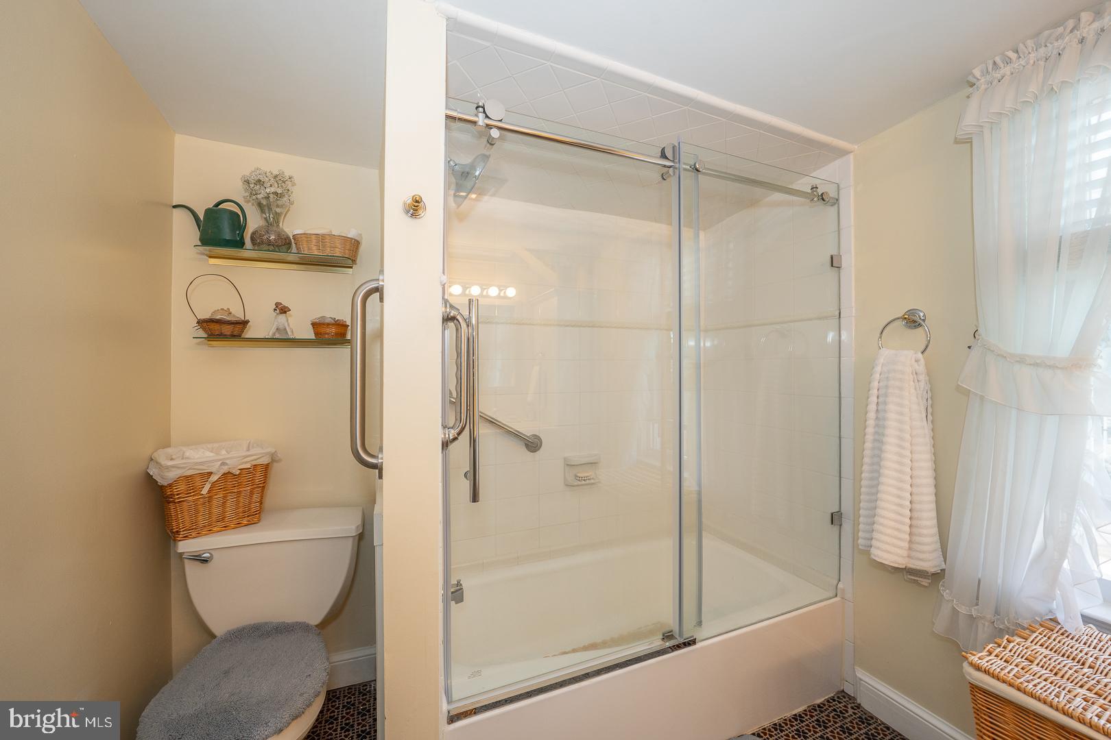 255 Willow Avenue Wayne, PA 19087 - Photo 29 of 46 a bathroom with a shower and toilet