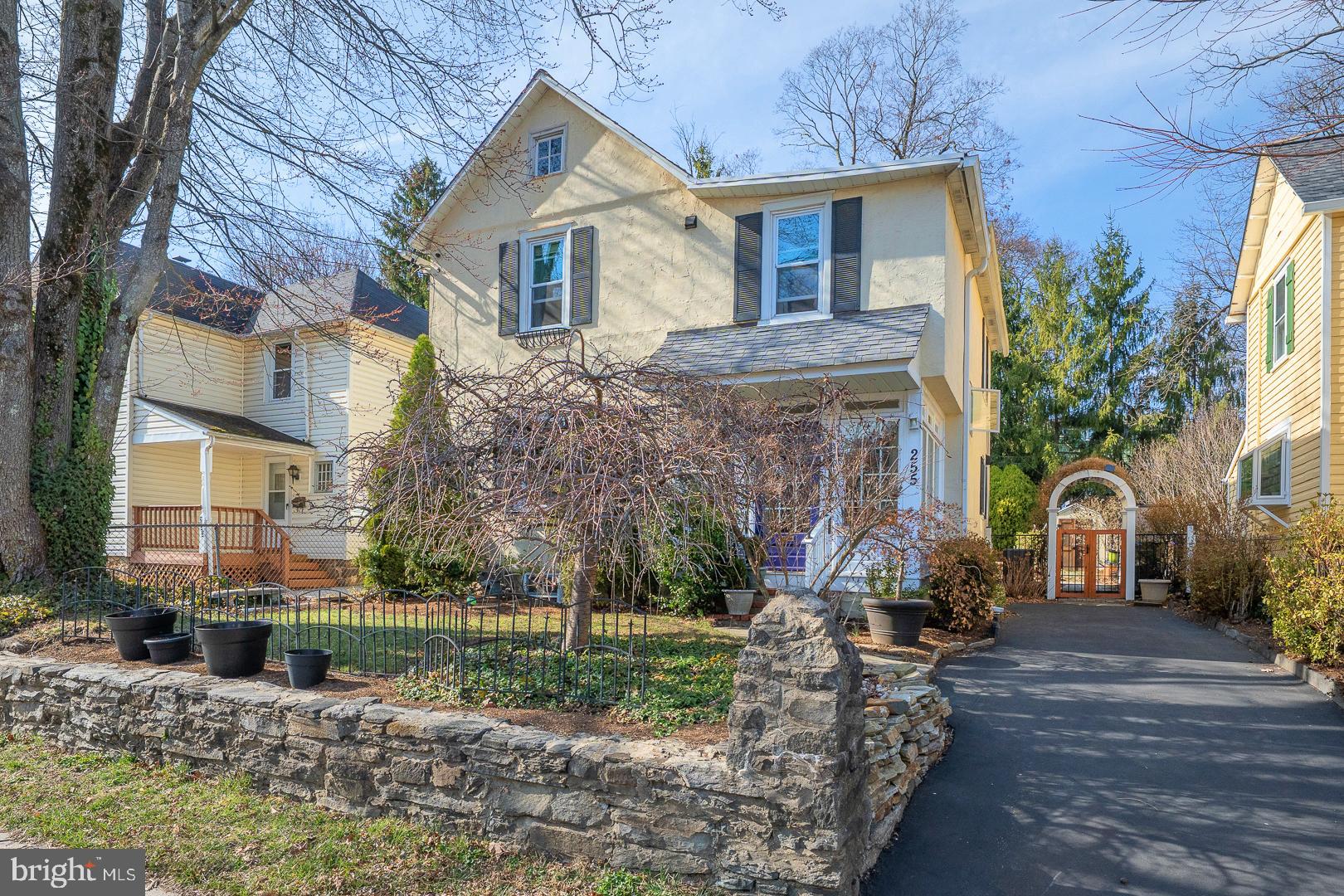 255 Willow Avenue Wayne, PA 19087 - Photo 3 of 46 a front view of a house with a yard