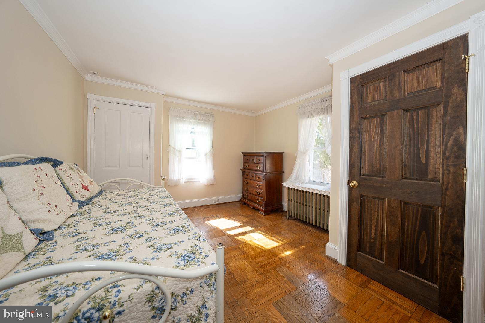 255 Willow Avenue Wayne, PA 19087 - Photo 33 of 46 a spacious bedroom with a bed and a window