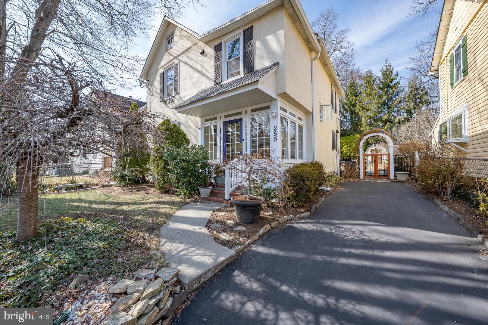 255 Willow Avenue Wayne, PA 19087 - Photo 4 of 46 a front view of a house with garden