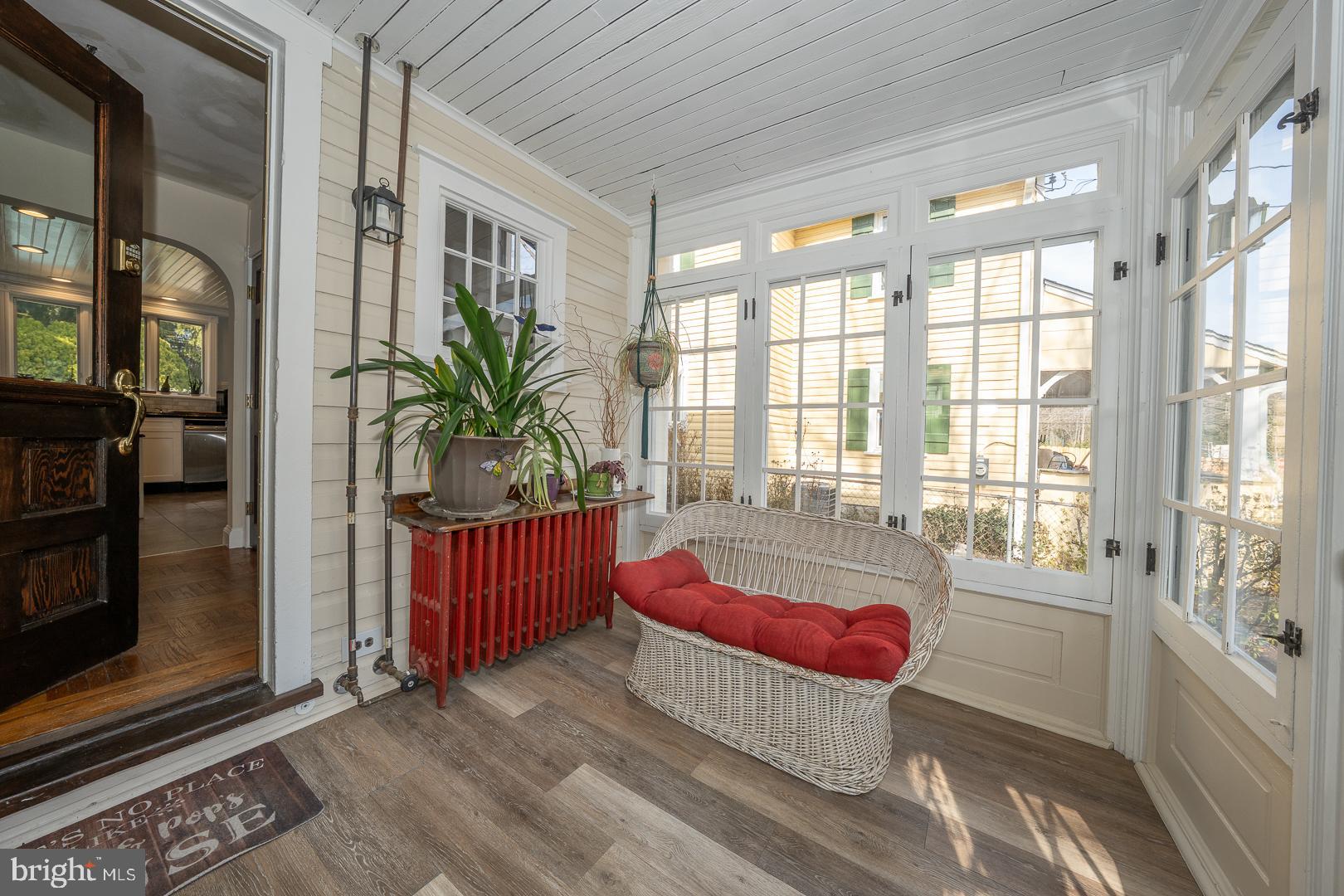 255 Willow Avenue Wayne, PA 19087 - Photo 6 of 46 a living room with furniture large window and wooden floor