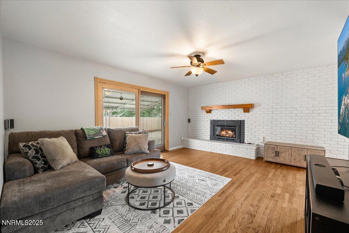 610 Akard Circle Reno, NV 89503 - Photo 11 of 28 a living room with furniture and a fireplace