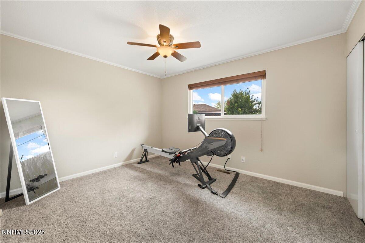 610 Akard Circle Reno, NV 89503 - Photo 19 of 28 a room with gym equipment and windows