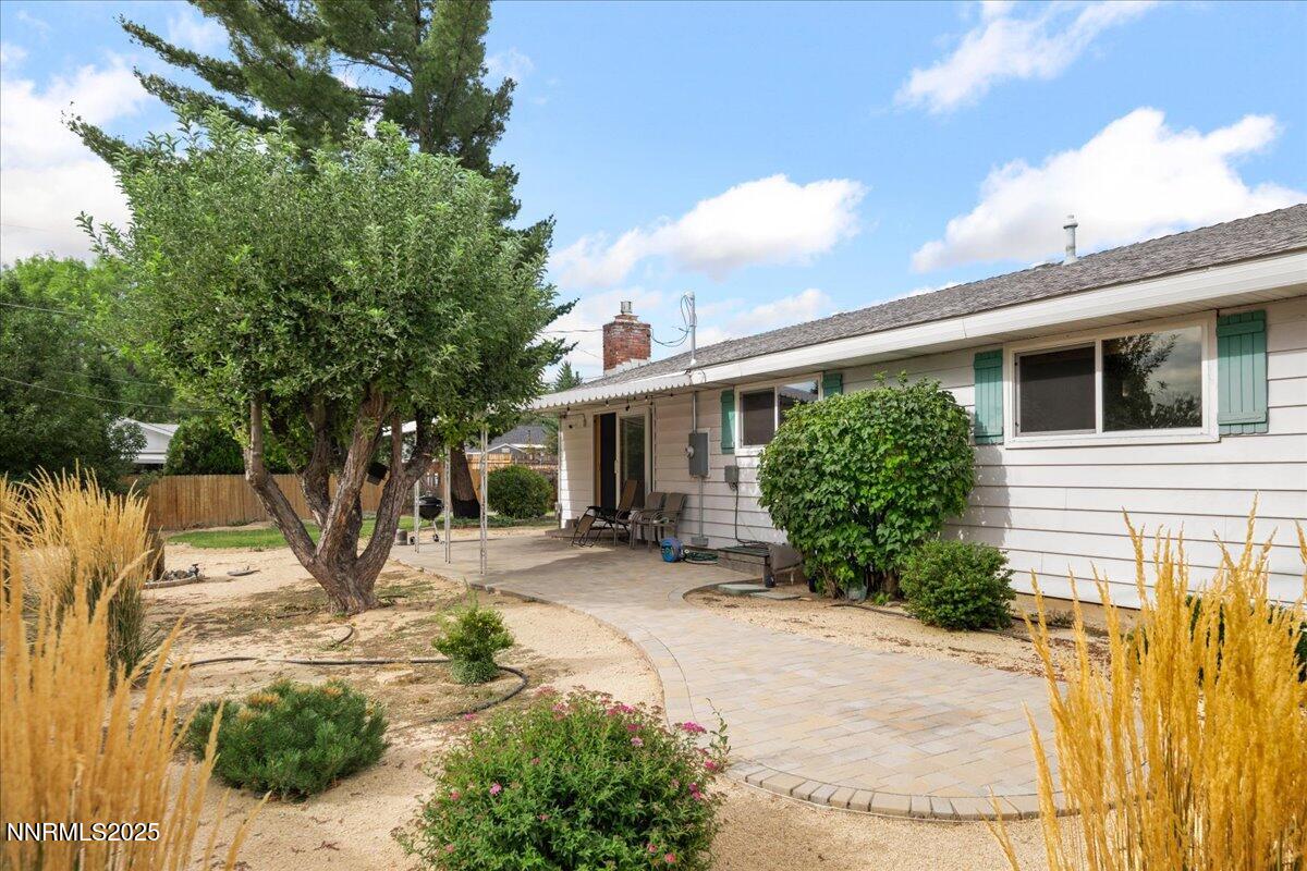 610 Akard Circle Reno, NV 89503 - Photo 22 of 28 a front view of a house with garden