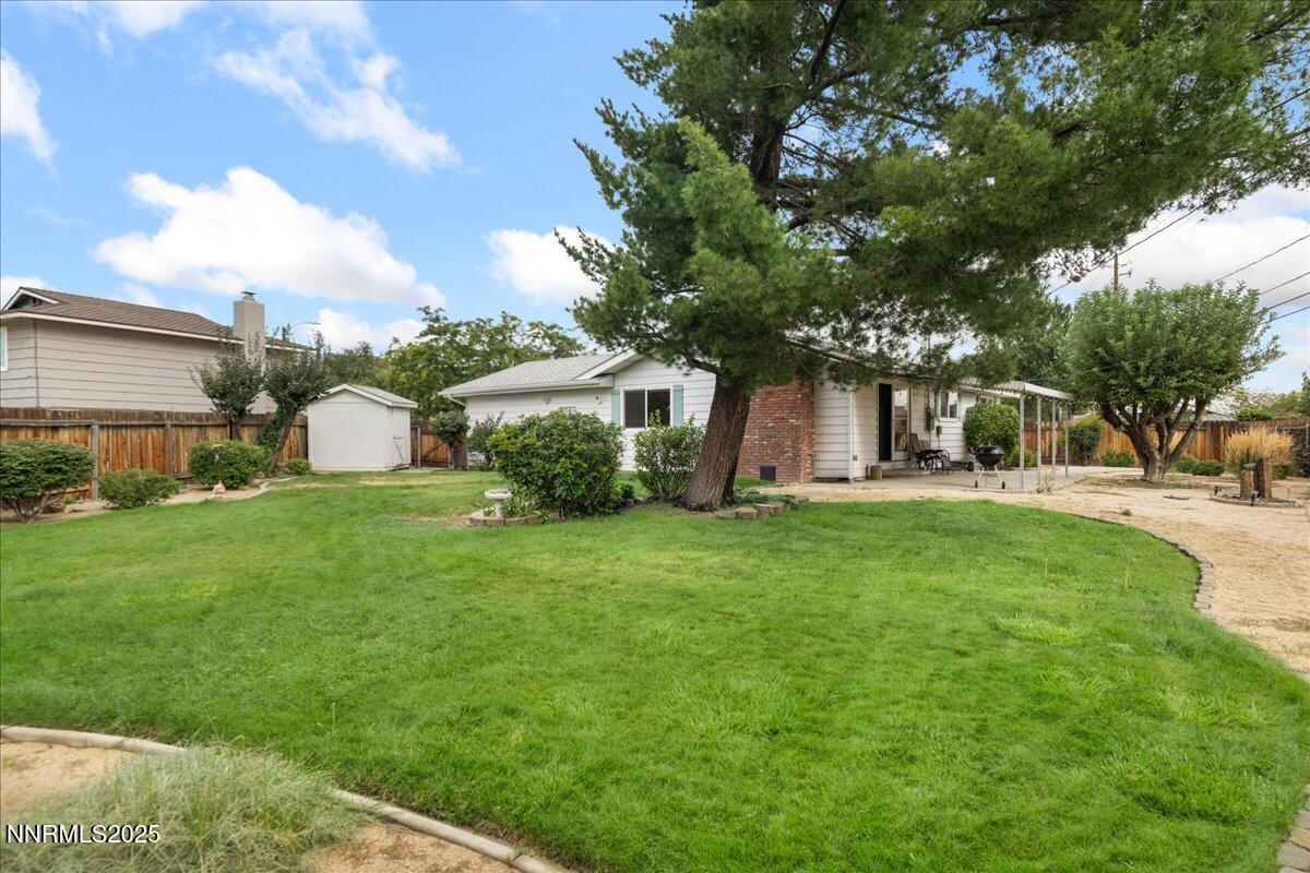 610 Akard Circle Reno, NV 89503 - Photo 23 of 28 a front view of a house with garden