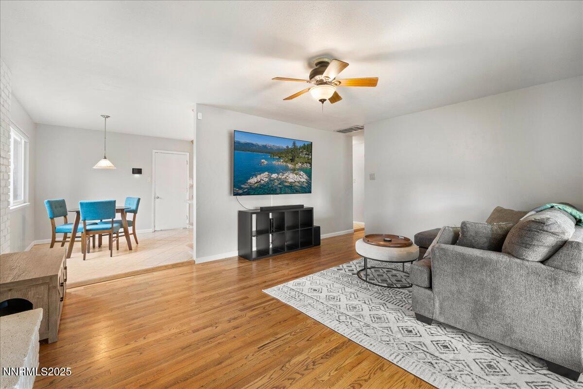 610 Akard Circle Reno, NV 89503 - Photo 9 of 28 a living room with furniture and a wooden floor