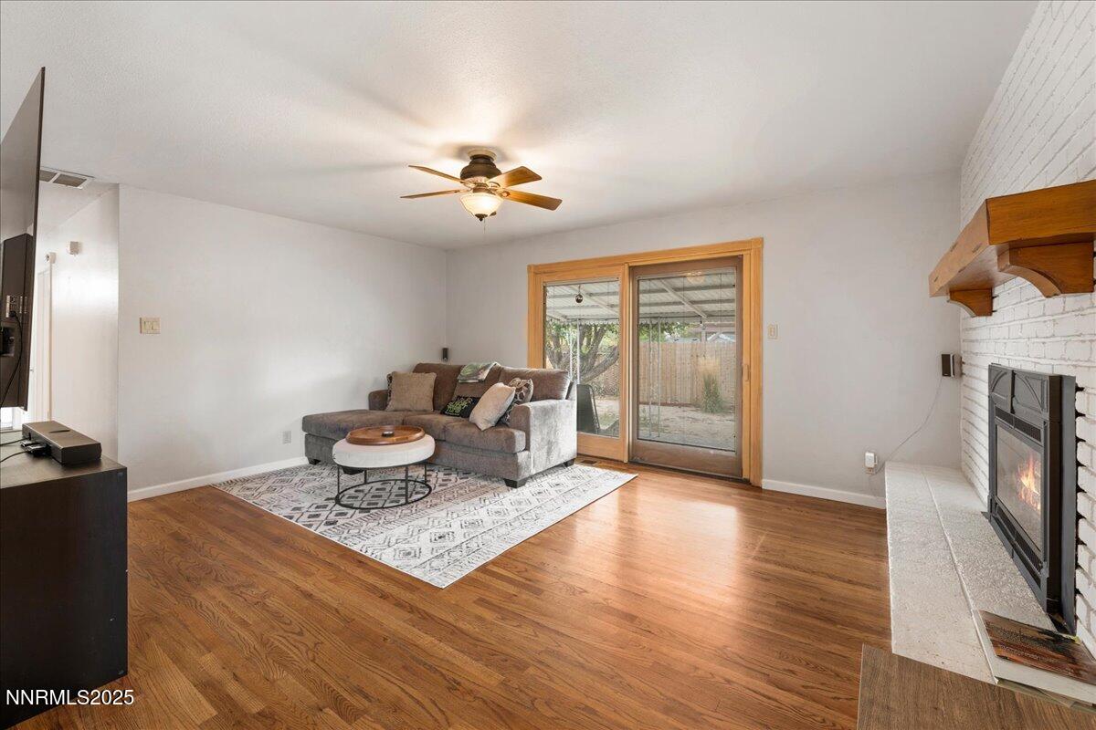 610 Akard Circle Reno, NV 89503 - Photo 10 of 28 a living room with furniture and a flat screen tv