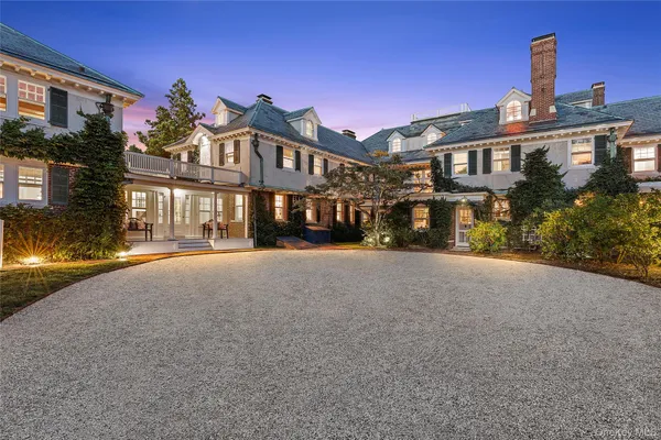 a front view of a building with a street