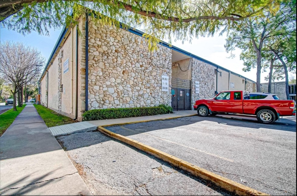 1903 Commonwealth Street, Unit 31 Houston, TX 77006 - Photo 6 of 6 a car parked in front of a house
