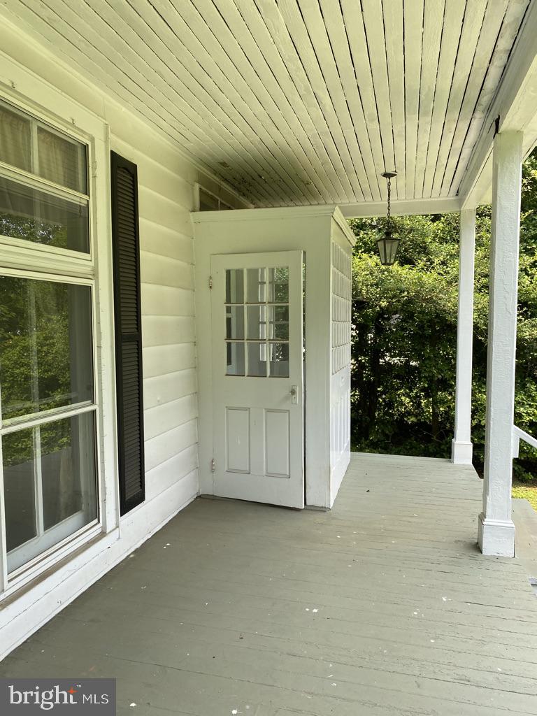 622 Rock Spring Road Bel Air, MD 21014 - Photo 2 of 37 Rectangular air lock on porch shelters front door