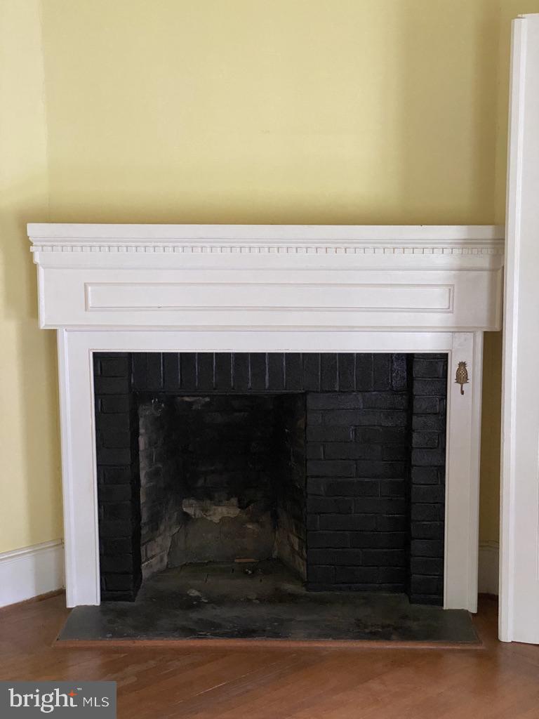 622 Rock Spring Road Bel Air, MD 21014 - Photo 6 of 37 Living room fireplace (not working)