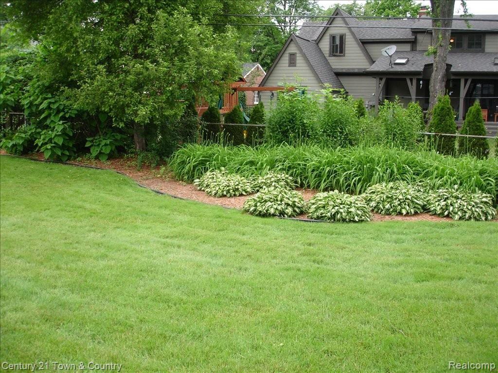 1511 East Maple Road Birmingham, MI 48009 - Photo 16 of 23 Nicely Landscaped Backyard