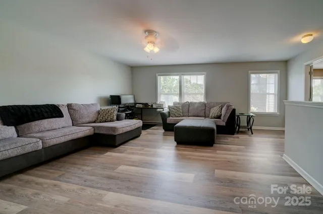 a living room with furniture and a couch