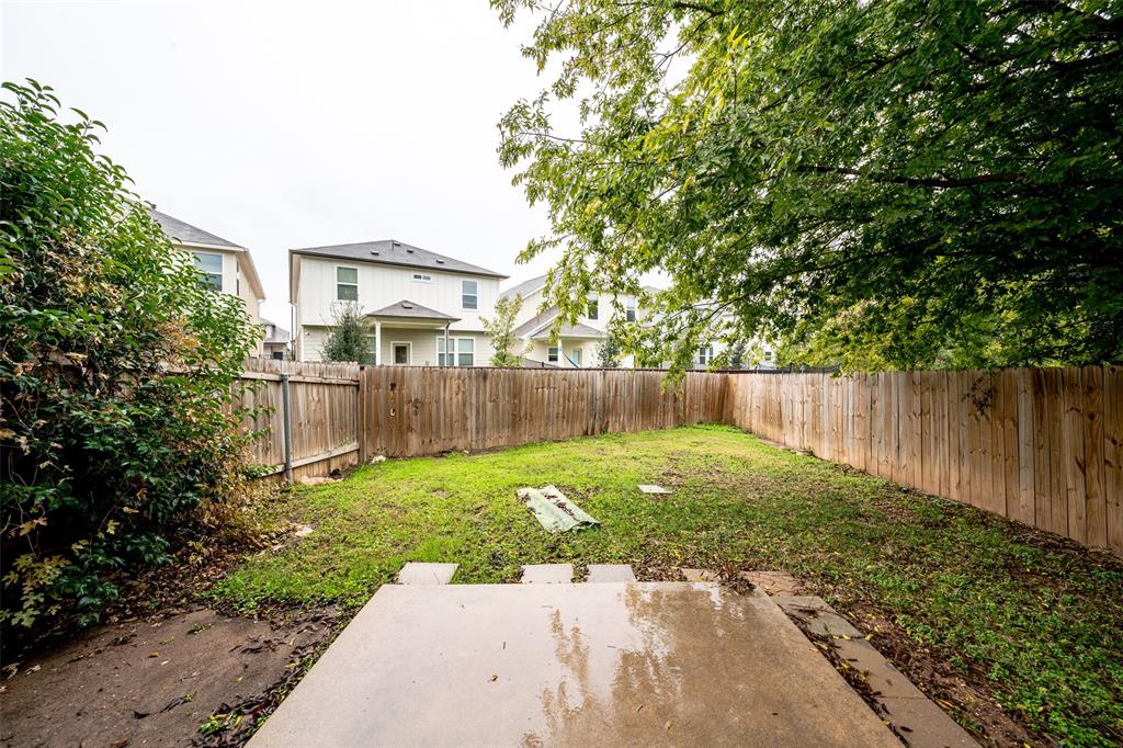 9927 Bilbrook Place, Unit B Austin, TX 78748 - Photo 12 of 13 Fenced backyard featuring a patio