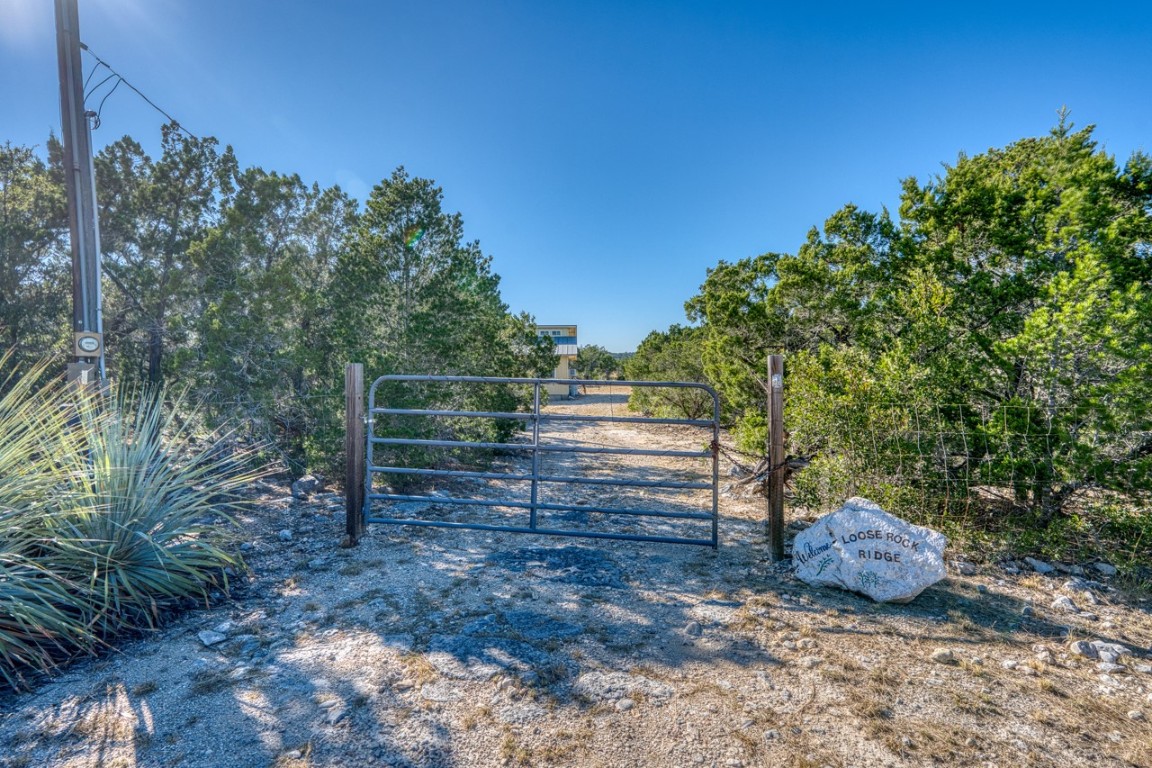 509 Pinon Loop East Camp Wood, TX 78833 - Photo 17 of 24 a view of outdoor space with deck and yard