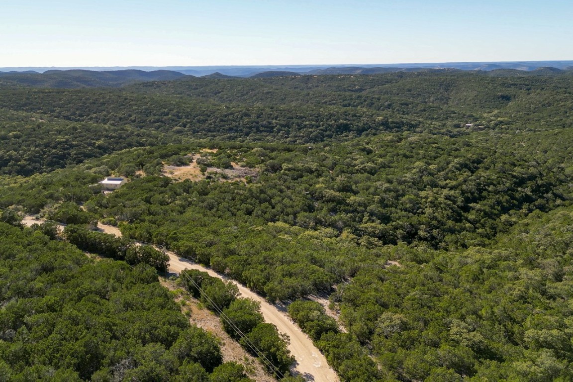 509 Pinon Loop East Camp Wood, TX 78833 - Photo 18 of 24 a view of a field with an trees