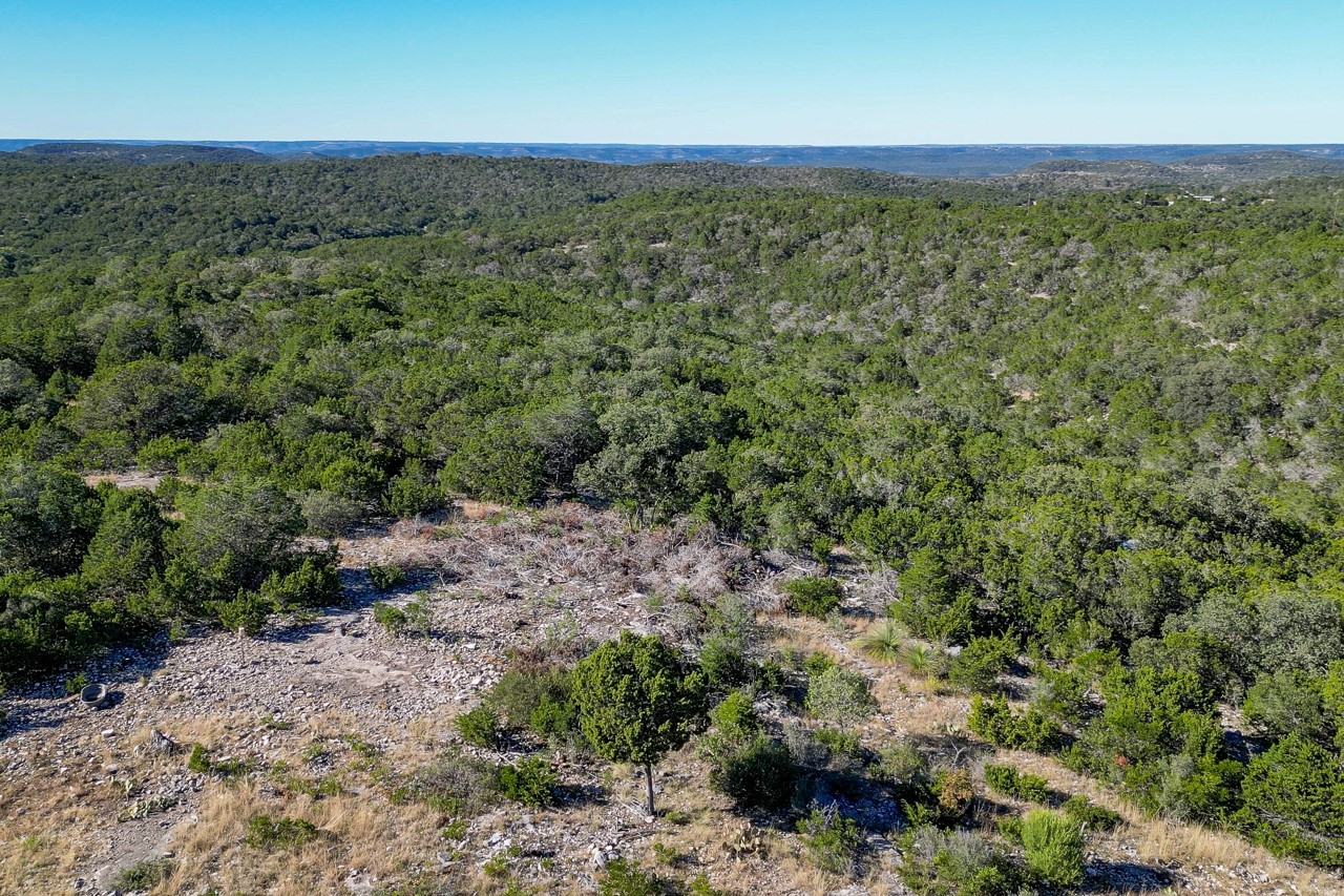 509 Pinon Loop East Camp Wood, TX 78833 - Photo 21 of 24 a view of a field with an outdoor space