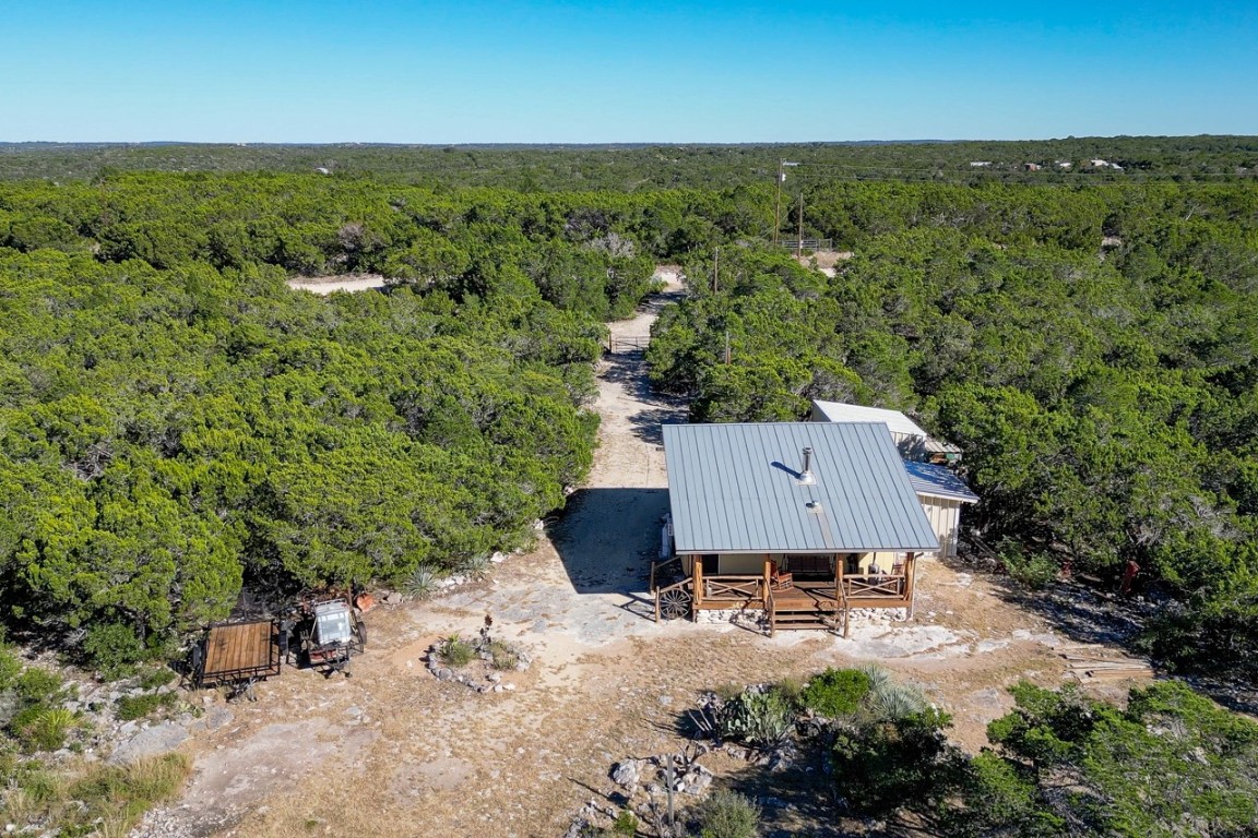 509 Pinon Loop East Camp Wood, TX 78833 - Photo 4 of 24 an aerial view of a house with yard and lake view