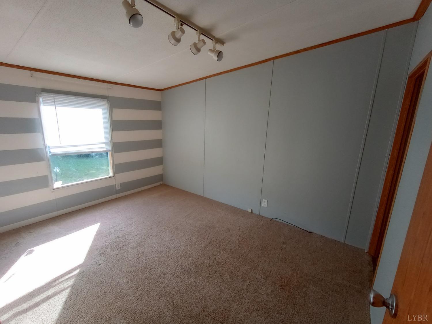 581 Red Oak School Road Rustburg, VA 24588 - Photo 14 of 17 a view of a room that has a window in it