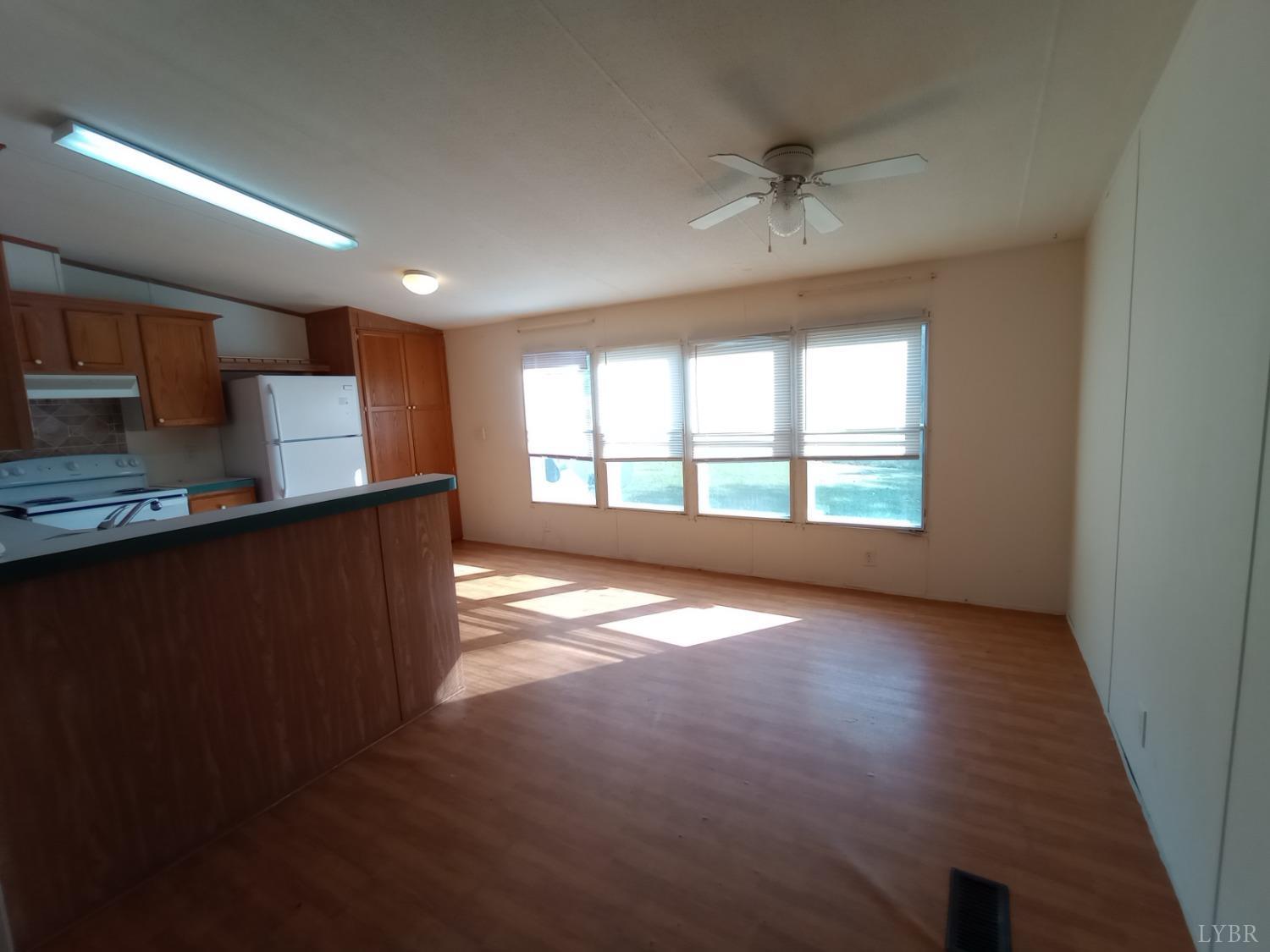 581 Red Oak School Road Rustburg, VA 24588 - Photo 6 of 17 a view of an empty room with a window