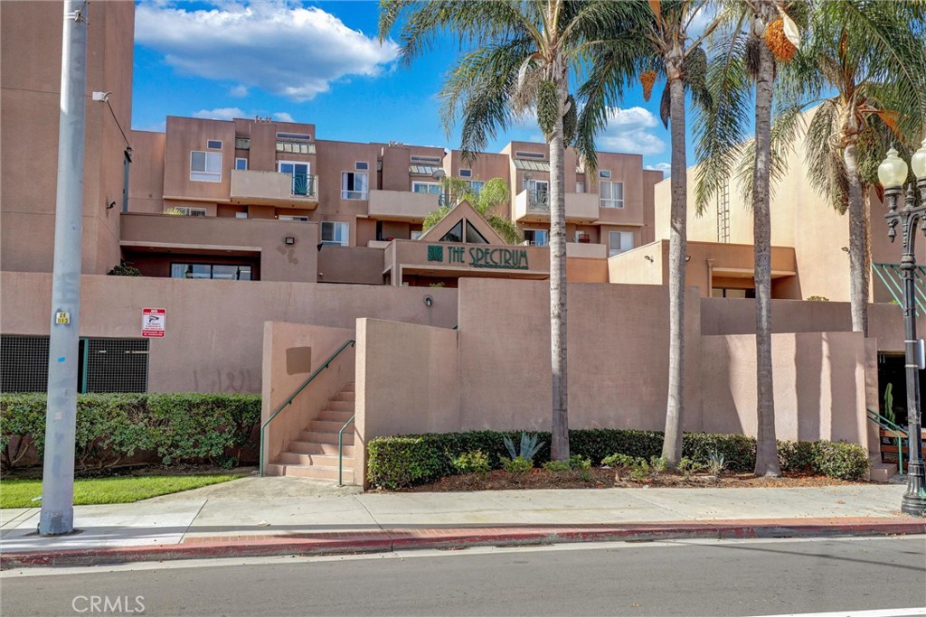 450 East 4th Street, Unit 337 Santa Ana, CA 92701 - Photo 1 of 26 a view of a building with a palm tree