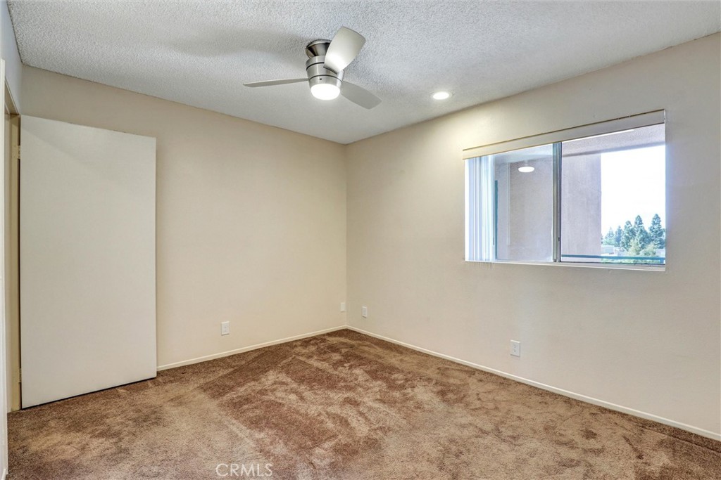 450 East 4th Street, Unit 337 Santa Ana, CA 92701 - Photo 16 of 26 an empty room with windows
