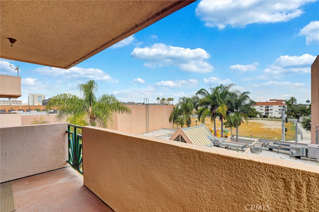 450 East 4th Street, Unit 337 Santa Ana, CA 92701 - Photo 17 of 26 a view of a swimming pool and an outdoor seating