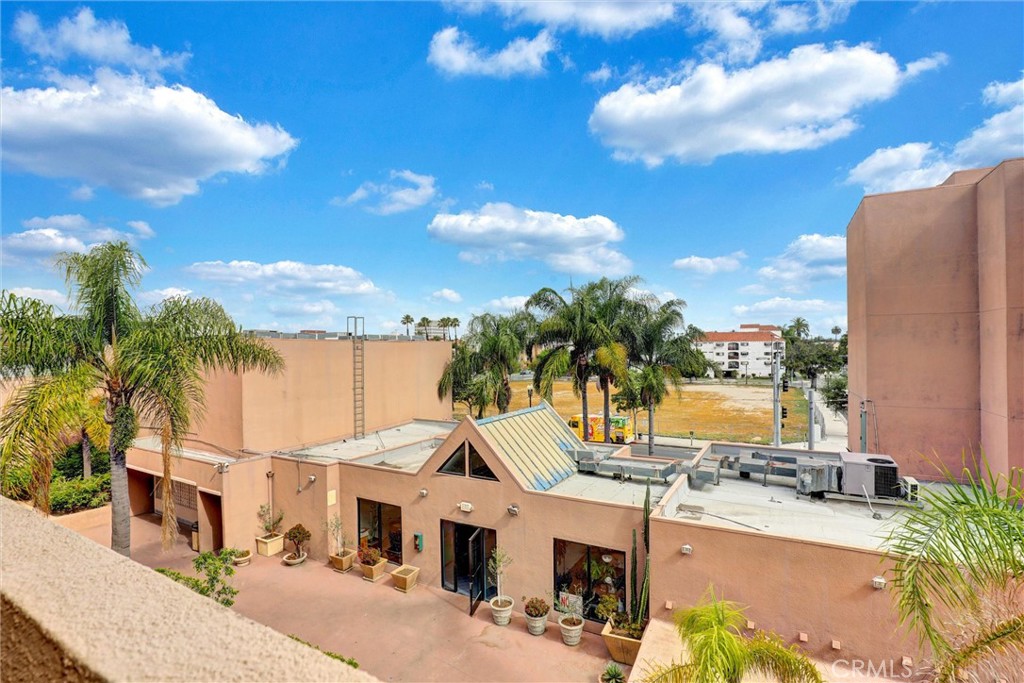 450 East 4th Street, Unit 337 Santa Ana, CA 92701 - Photo 18 of 26 a view of a patio with swimming pool