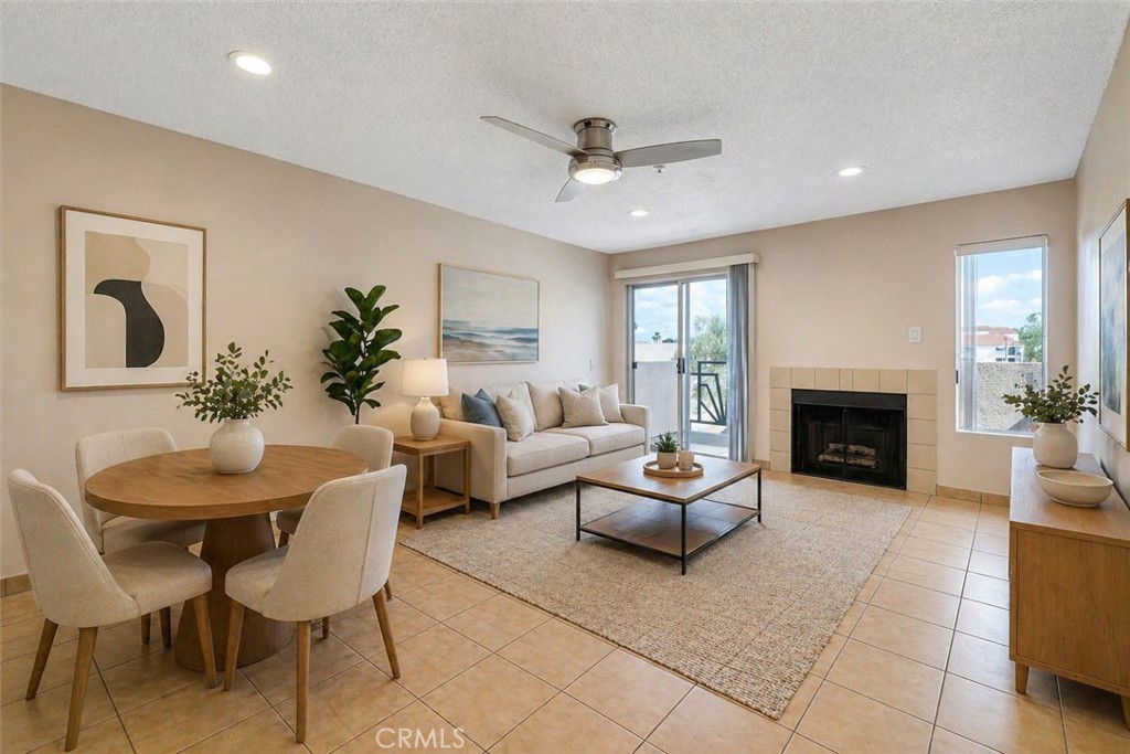 450 East 4th Street, Unit 337 Santa Ana, CA 92701 - Photo 3 of 26 a living room with furniture and a fireplace