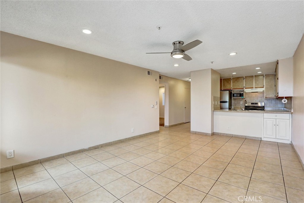 450 East 4th Street, Unit 337 Santa Ana, CA 92701 - Photo 6 of 26 a view of a kitchen with a sink and cabinets