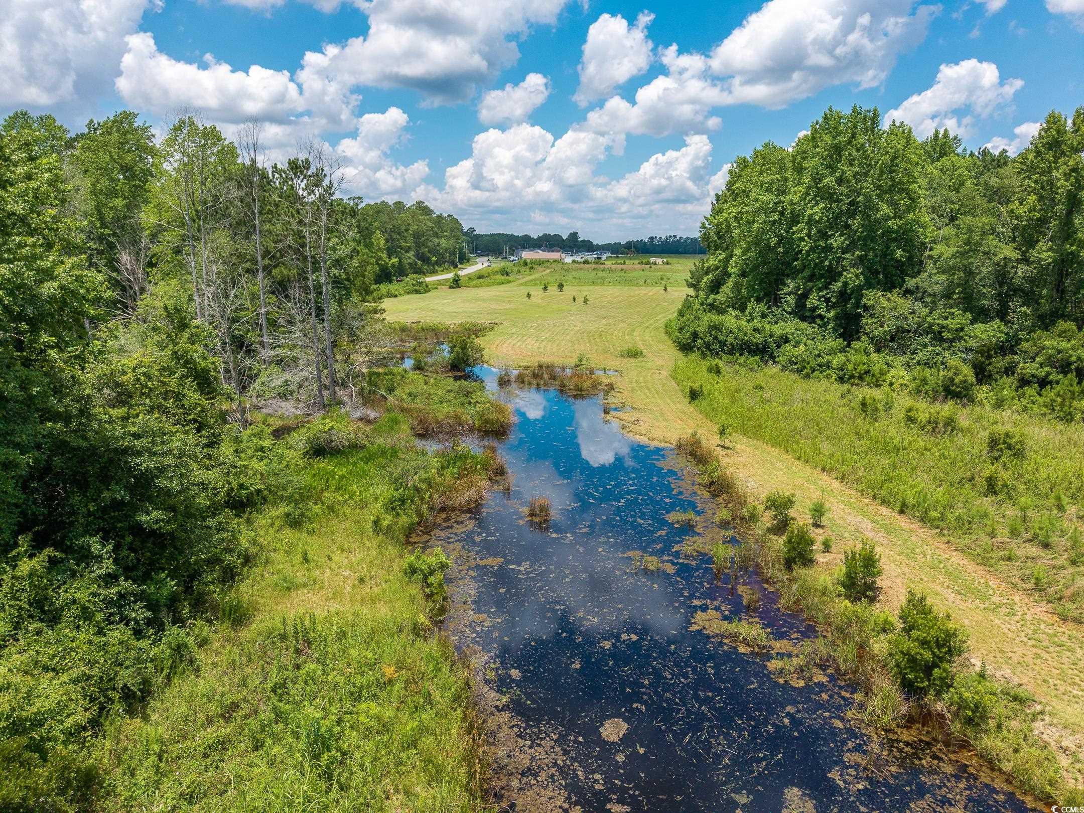 214 Allsbrook Road Loris, SC 29569 - Photo 12 of 15 Drone / aerial view of a nearby body of water