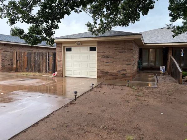 a view of a house with a patio