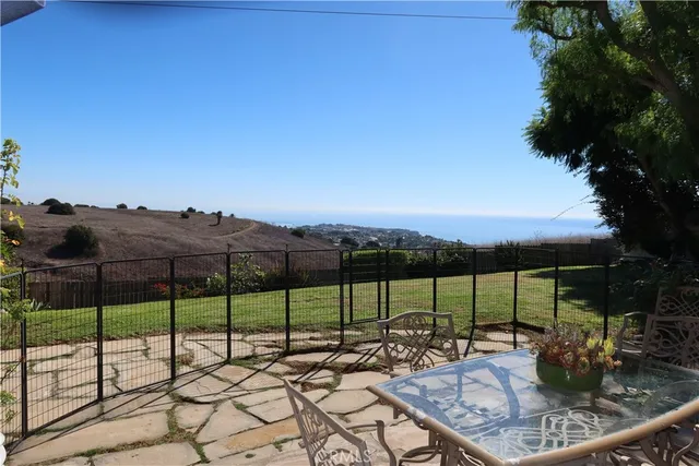 a view of a entryway of the house with potted plants