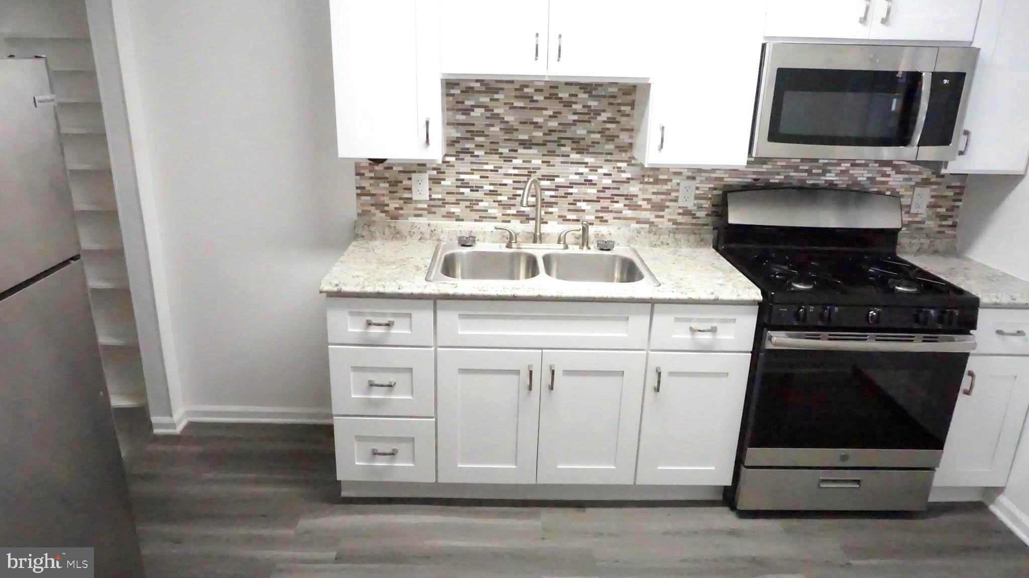 8155 Kavanagh Road Baltimore, MD 21222 - Photo 13 of 24 Brand New Beautiful Kitchen w/Backsplash