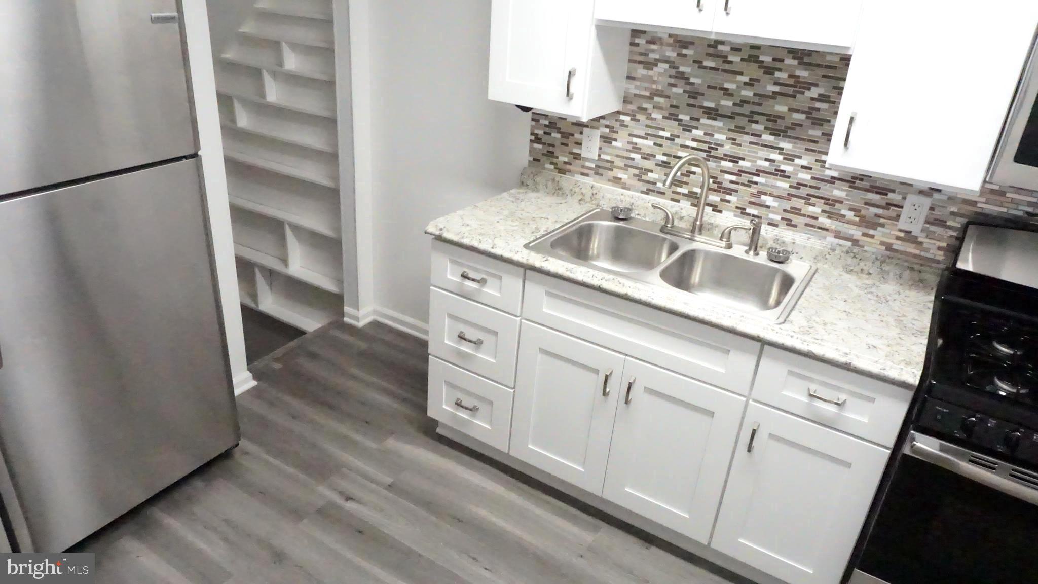 8155 Kavanagh Road Baltimore, MD 21222 - Photo 14 of 24 SS Appliances, Laminate Floors,Soft Close Cabinets
