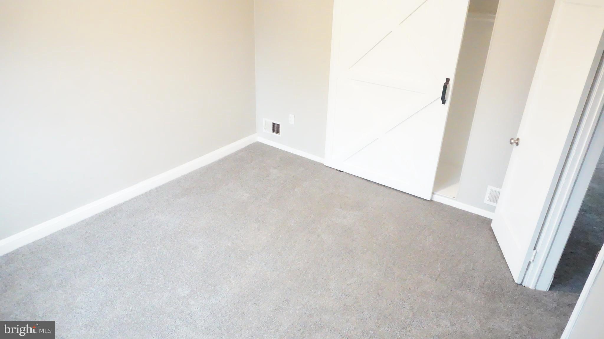 8155 Kavanagh Road Baltimore, MD 21222 - Photo 21 of 24 Bedroom #2 w/ Barn Door Closet